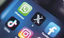 mobile phone screen close up view focusing on the twitter now x icon: Sonora, Mexico - September 13, 2023